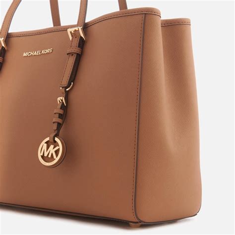 michael kors travel tote|Michael Kors jet set airplane.